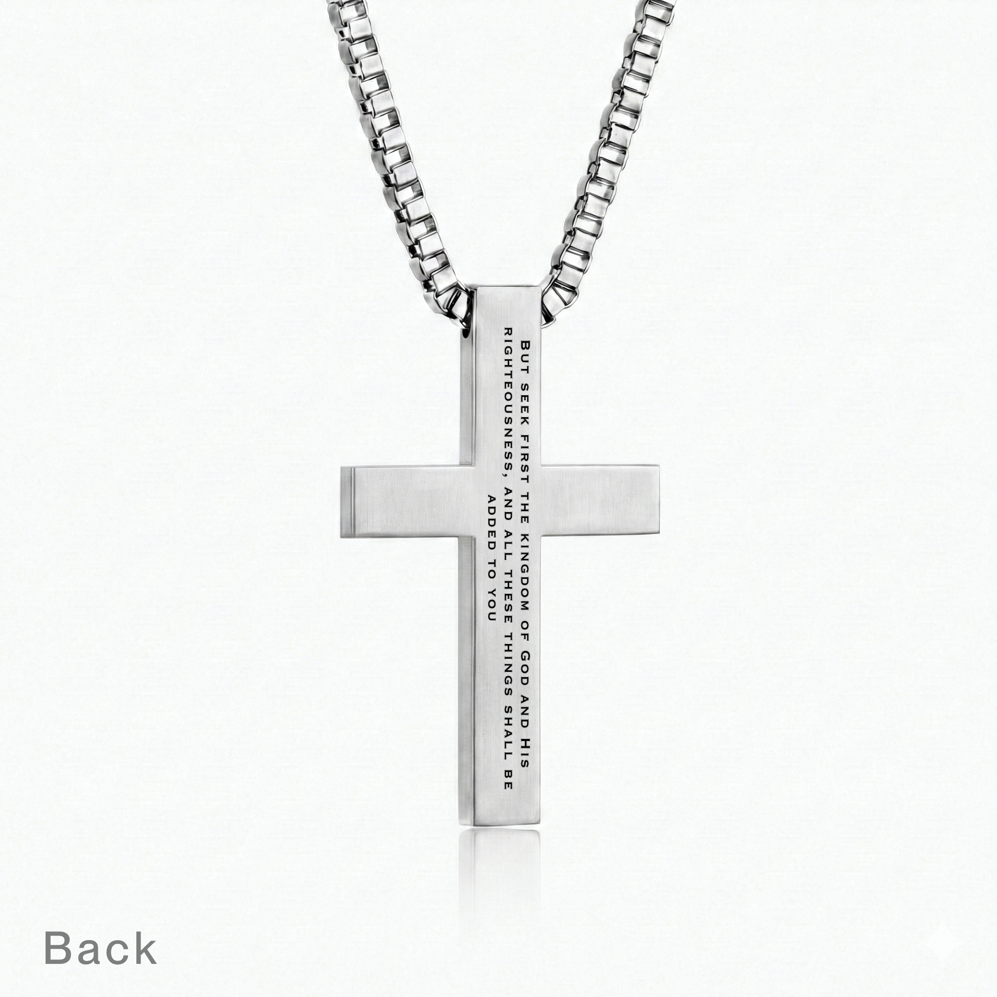 Matthew 6:33 | Cross pendant back showing Seek first his kingdom and his righteousness engraved verse