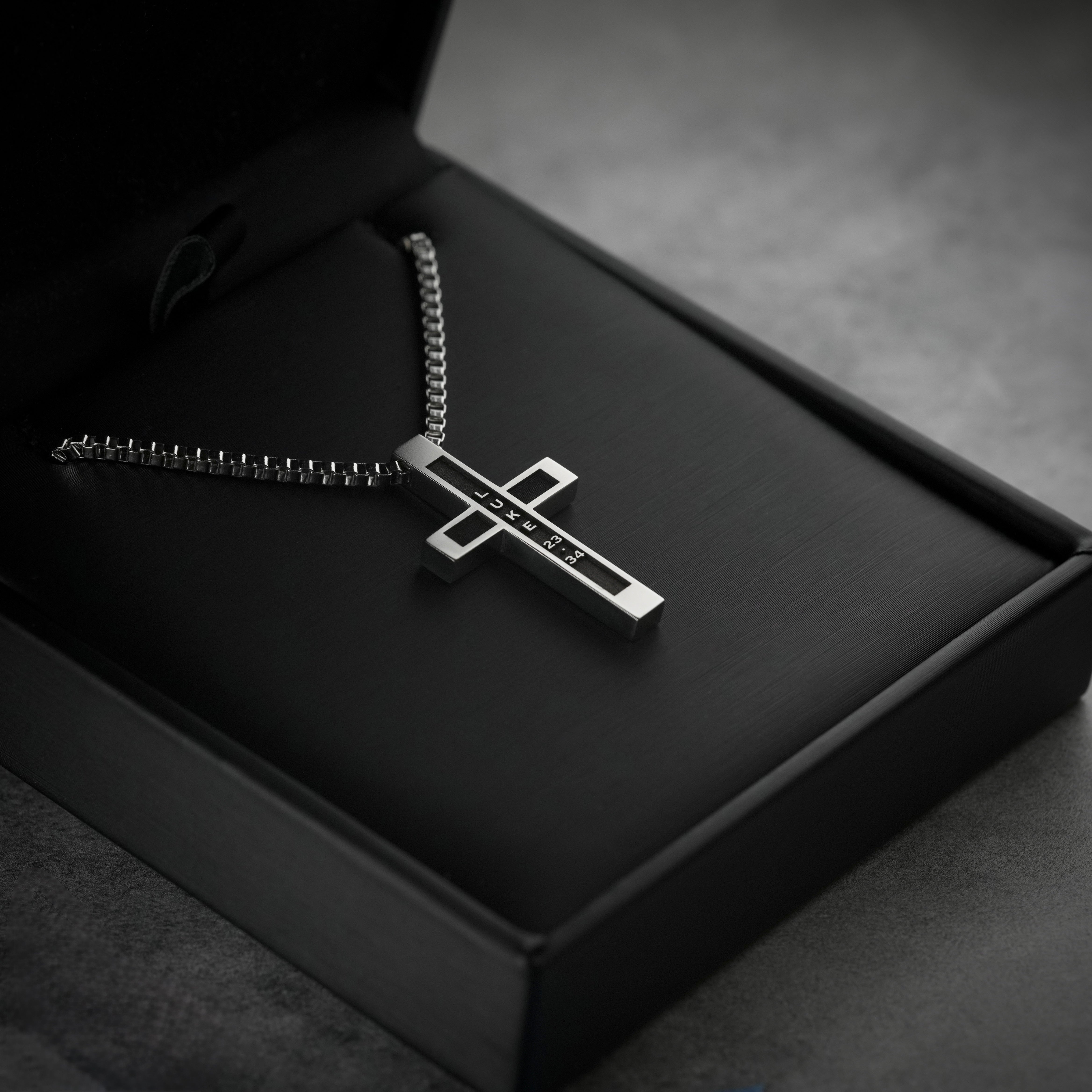 Luke 23:34 | Summit Cross mens necklace displayed in black gift box