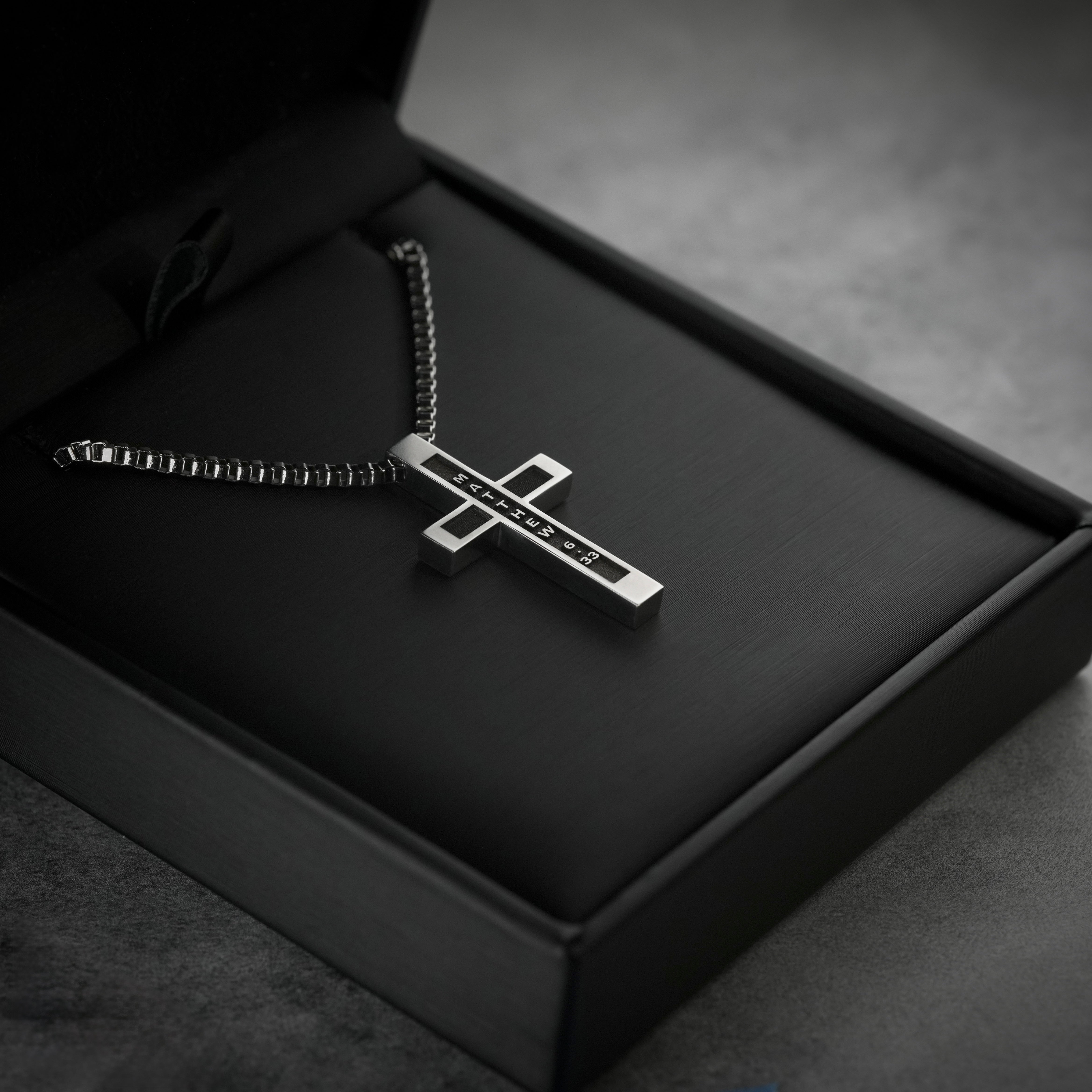 Matthew 6:33 | Summit Cross mens necklace displayed in black gift box