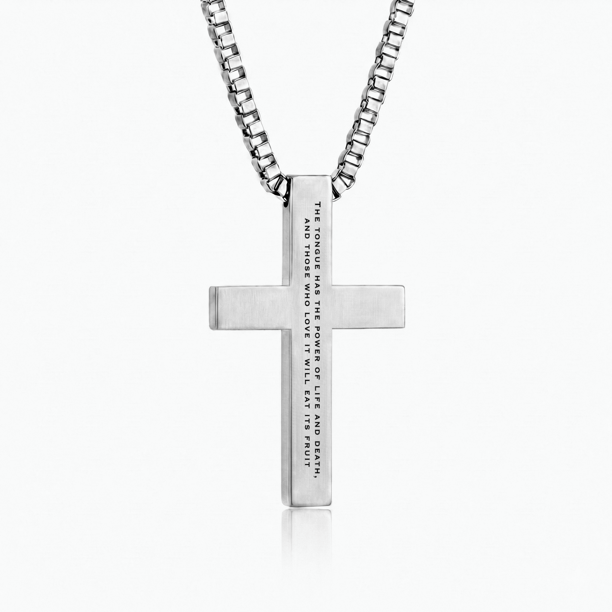 Proverbs 18:21 | Cross pendant back showing The tongue has the power of life and death engraved verse